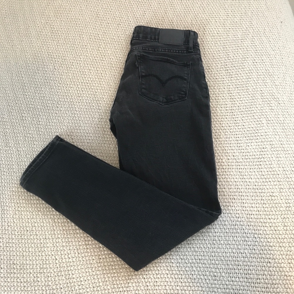 Levi’s 711 Faded Black Skinny Jeans